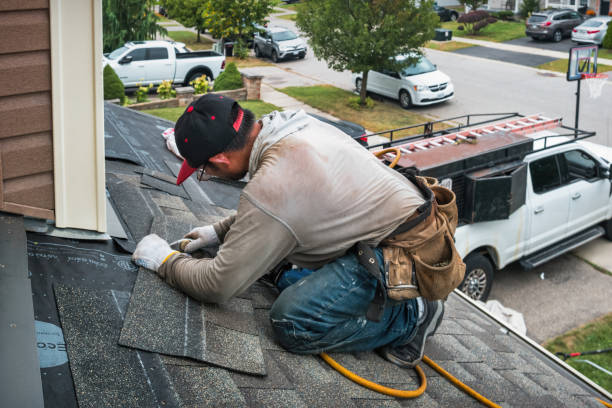 Professional Emergency Roof Repair technician working in Burt, MI